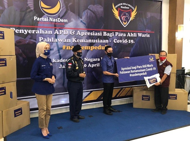 NasDem Bagi 5000 APD Dan Santunan Rp450 Juta Kepada Ahli Waris Tim Medis 