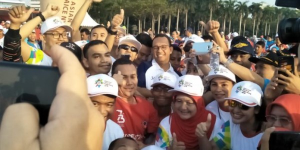 Gubernur DKI Bersama Kapolda Metro Arak Obor Asian Games Ke GBK