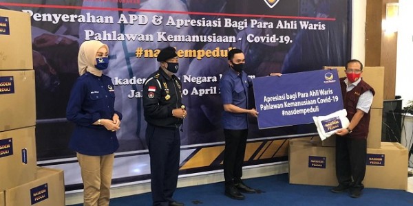NasDem Bagi 5000 APD Dan Santunan Rp450 Juta Kepada Ahli Waris Tim Medis 